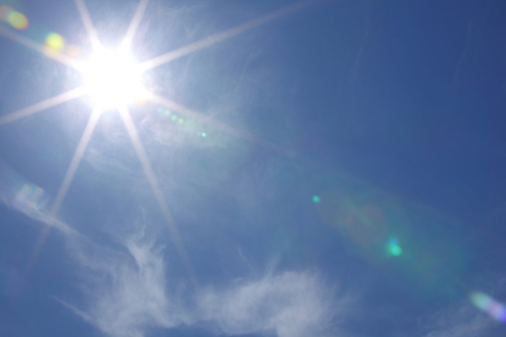 sun in blue day sky